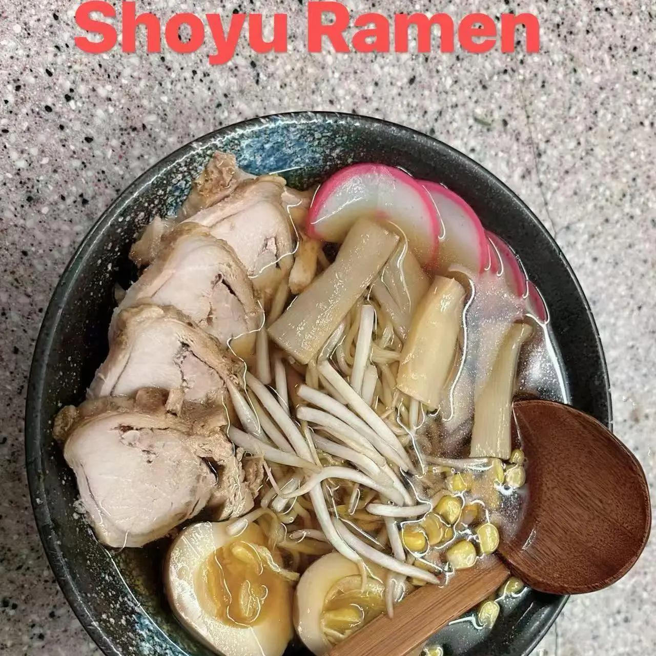 Shoyu ramen with chicken, soft - boiled eggs, bean sprouts, pickled radish, and bamboo shoots at FUJI SAN Japanese restaurant in Vestal